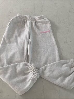 Edikted Light Gray Sweatpants with Pink Logo
